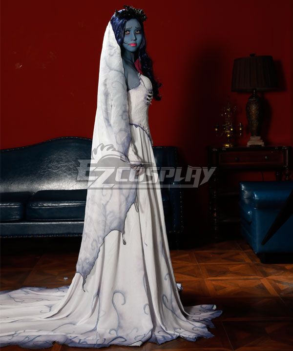Rear-view full-body official studio shot, fully display continuous blue ink swirl gradient print covering the whole long train, jagged torn veil edge with faded purple shadow dye, hollow skeleton arm print on outer sleeve, dark floral crown on top of long blue wig