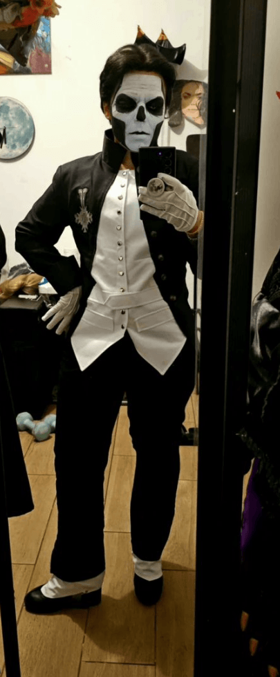 ndoor mirror selfie by @Ariela wearing complete Papa Emeritus costume, skull makeup, tailored black tailcoat, white waistcoat, gloves and matching shoes