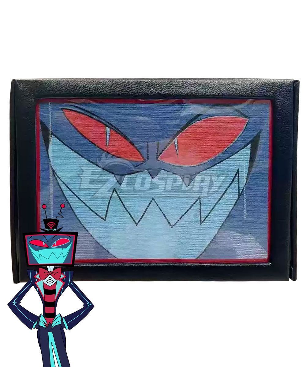 Black frame TV-shaped mask prop flat lay shot, printed with Vox’s signature sharp red eyes and jagged cyan grinning face, cartoon character illustration attached at bottom left to reference facial print proportion